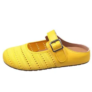 Vibrant yellow mesh mule shoes with buckle strap and closed-toe slip-on design for women.