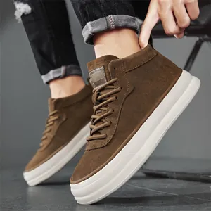 Men's brown suede high-top platform sneakers featuring a thick white sole for street style