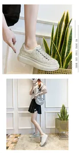 Women's luxury rhinestone platform sneakers featuring glittering crystals and thick soles
