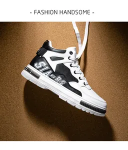 Detail of mid-top black and white microfiber leather skateboard shoe on textured background