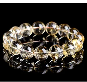 Detailed close-up of natural Brazilian citrine beads showing inner textures
