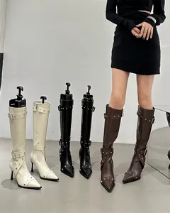 Knee-high boots in three colors featuring silver stud details and stylish pointed toe