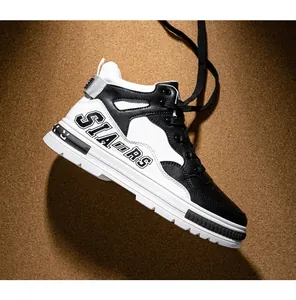 Side view of black and white mid-top microfiber leather skateboard sneakers for men