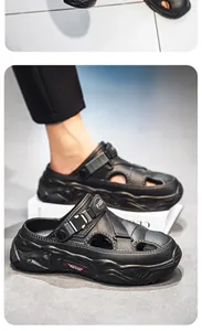 Detailed close-up shot of black chunky men's casual sandals with adjustable strap buckle