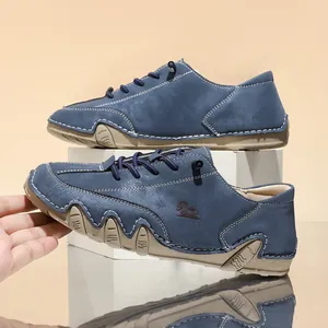 Detailed side view of blue octopus sole casual shoes with decorative white stitching