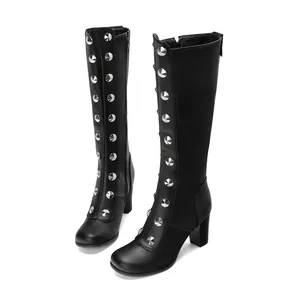 Black knee-high boots featuring silver rivet decorations and stable block heels