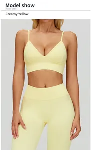 Close-up of cream yellow V-neck sports bra and matching high-waisted yoga leggings