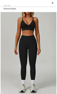 Model wearing black V-neck sports bra and leggings for fitness and yoga sessions