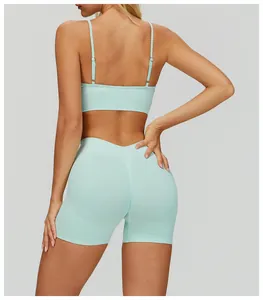 Detail view of back straps on mint green rib-knit sports bra and shorts yoga set
