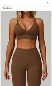 Close-up of a dark coffee colored V-neck sports bra with thin straps on a model