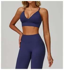 Detail of purple V-neck yoga sports bra with adjustable thin straps and matte finish