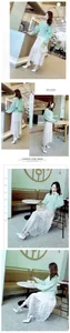 Detailed shots of elegant white stiletto pumps with dual rhinestone ankle straps.