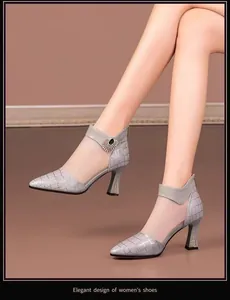 Close-up detail of grey textured pointed-toe high heels with elegant ankle strap jewel