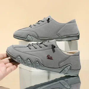 Detailed view of grey wide-fit casual shoes featuring a unique octopus lug sole
