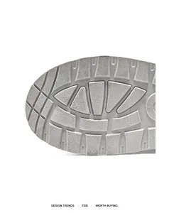 Close-up of anti-slip rubber outsole texture on men's winter cotton shoes