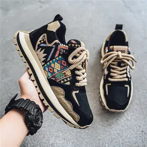 Ethnic style low-top sneakers for men with multi-colored geometric patterns and thick rope laces