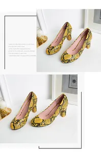 Elegant yellow snakeskin pattern round toe chunky heel pumps for professional wear.