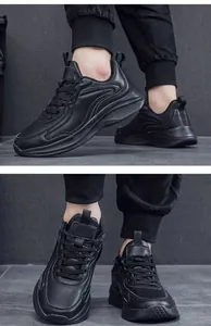 Detail view of black water-repellent leather sneakers for men with non-slip sole