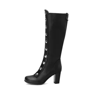 Side view of black knee-high knight boots with silver stud detailing and chunky heel