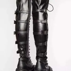 Professional photo of black over-the-knee boots featuring multiple buckle straps and round toe