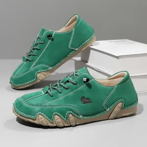 Detail view of green wide-last leather casual shoes with unique octopus-style soles