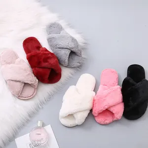 Cozy faux fur cross band slippers available in six colors for indoor and outdoor wear