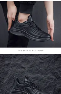 Close-up detail of black water-resistant leather work sneakers for men with a stylish design