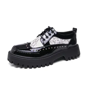 Black and white patent leather oxfords for men featuring rivets and thick platform soles