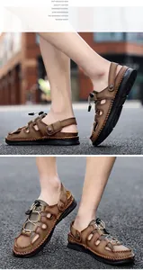 Detailed view of handmade stitching on brown leather closed-toe men's summer sandals.