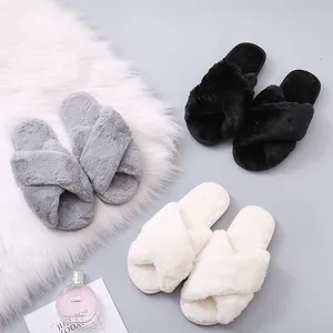 Detailed view of cozy plush cross-band home slippers in grey black and white colors