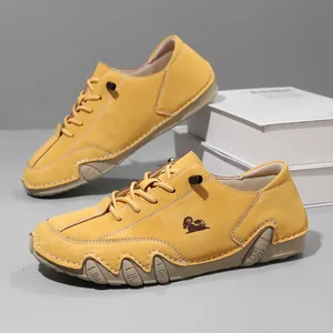 Close-up view of yellow low-top casual shoes with unique octopus-inspired rubber sole