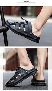 Close-up of men's hand-stitched black leather summer sandals with closed-toe design