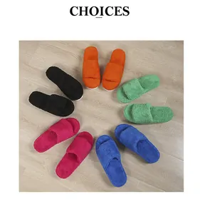 Detailed view of multiple colorful plush open-toe slippers arranged in a circle layout