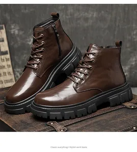 Detailed view of stylish brown leather Martin work boots with side zipper and rugged sole.