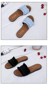 Detailed view of women's casual flat slides with decorative wood ear ruffles in two colors