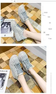 Detailed macro shot of women's sparkly rhinestone platform sneakers with wide grey laces