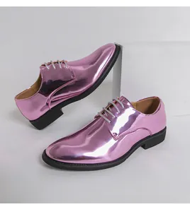 Side detail of metallic pink men's dress shoes with shiny finish and silver laces