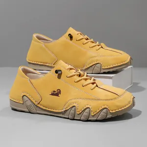Close-up of mustard yellow casual Martin shoes with unique octopus serrated sole