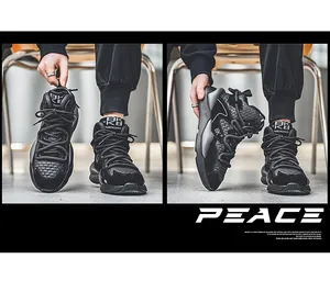Detail view of black chunky high-top sneakers with thick soles and stylish laces.