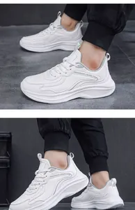 White synthetic leather men's sneakers with chunky soles and JGAK logo detail