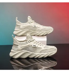 Detailed view of breathable cream mesh sneakers for men, perfect for summer running.