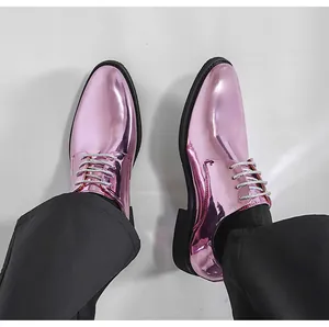 Detailed view of pink metallic men's derby shoes with pointed toes and silver laces