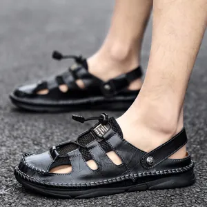 Men's closed-toe leather sandals with mesh panels and adjustable cord for outdoor leisure