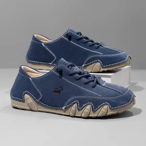 Detailed macro shot of blue suede low-top casual shoes with unique octopus-style rubber sole