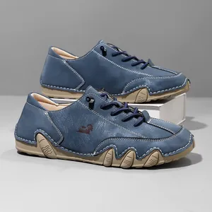 Detailed view of blue low-top casual Martin shoes with octopus ripple rubber soles