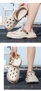 Detailed close-up view of beige men's breathable outdoor clogs for beach and summer use