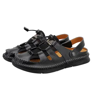 Men's black closed-toe leather sandals with hand-stitched sole and bungee laces