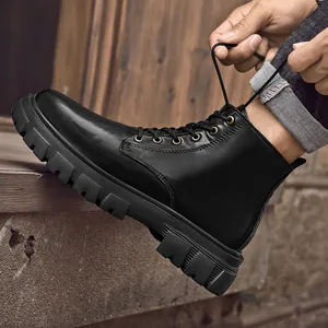 Classic black leather Martin boots with thick lug sole and high-top work boot design