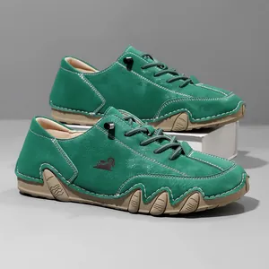 Detailed side view of green casual leather shoes with unique octopus-style wave sole
