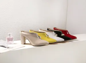 Side view of multi-color pointed toe block heel mules with pearl bead charms
